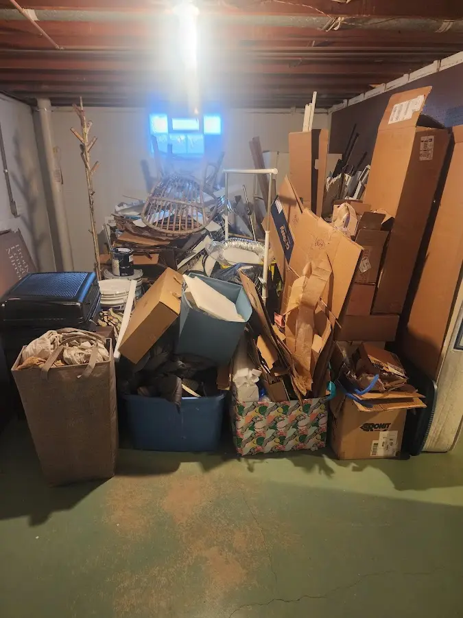 Roll-off dumpster container at job site for 2 Yard Dumpster Rental in Putnam